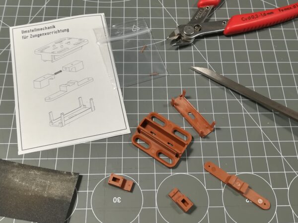Umstellmechanik für Zungenvorrichtung: Einzelteile
